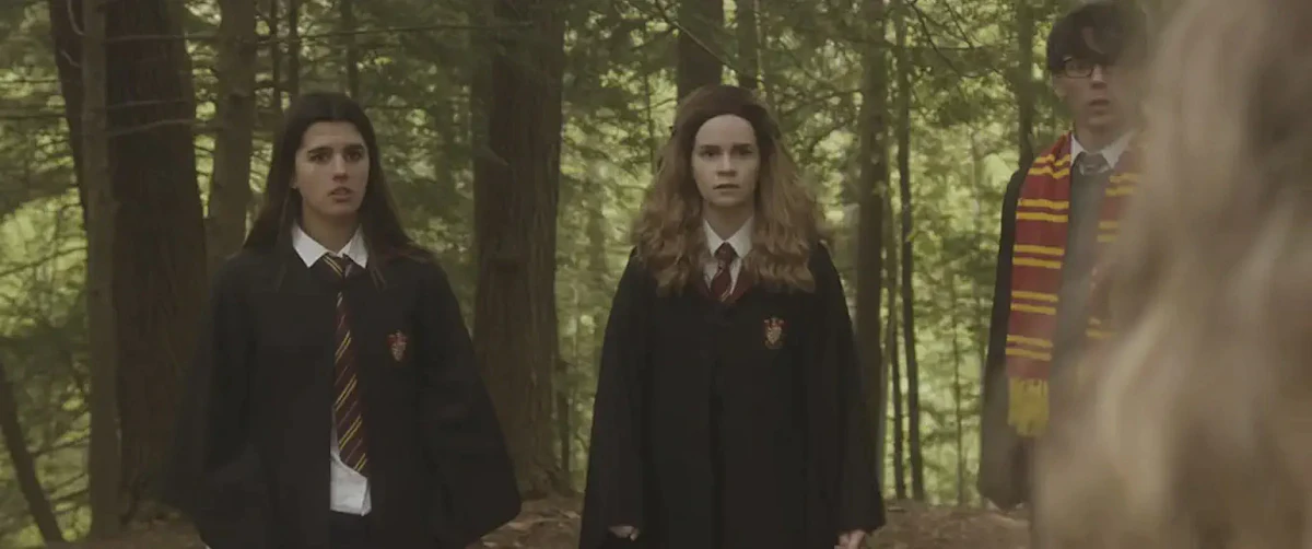 Hermione Granger (Kari Lewis) with Gryffindor students