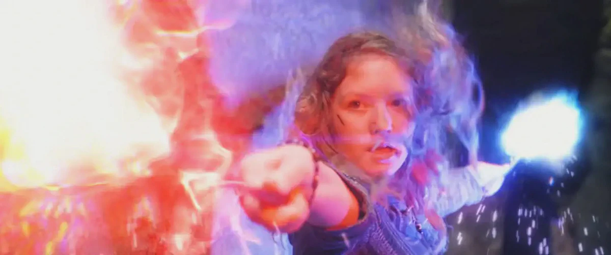Muriel Warrington (Makenna Weyburne) using two wands